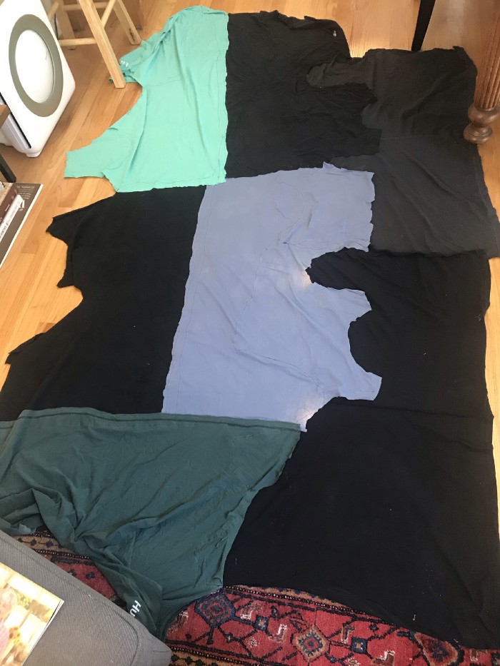 Extending the width. Note the rotated dark green shirt at the bottom — it adds an extra half-shirt of length to the column in the center, so that the shirts on the sides are shifted and fill in the gaps in the edges of the shirts in the center.